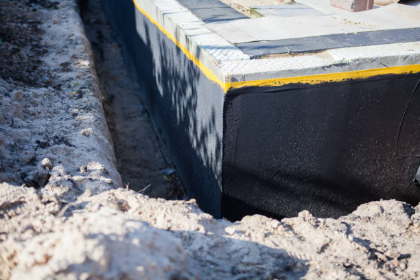 Professional Basement Waterproofing technician working in Independence, WI